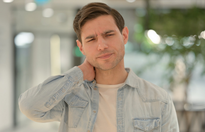 man having a neck pain